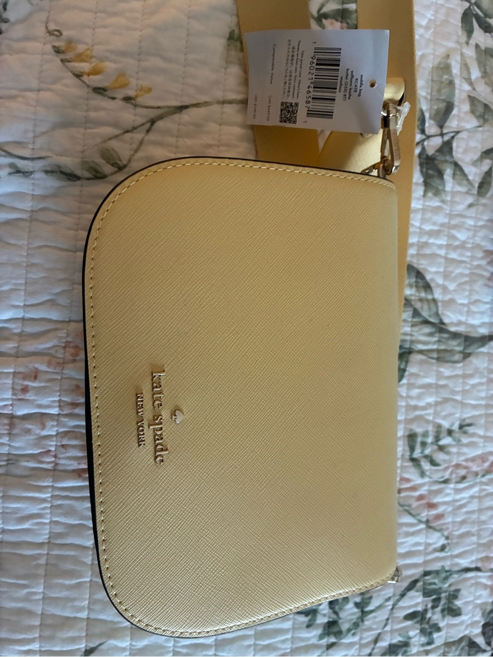 kate spade Pale Yellow Madison saddle bag in butter